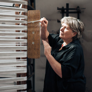 Anke McKernan making warp traditional weaving 